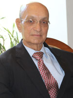 Photo of Mike C. Karia, Commissioner